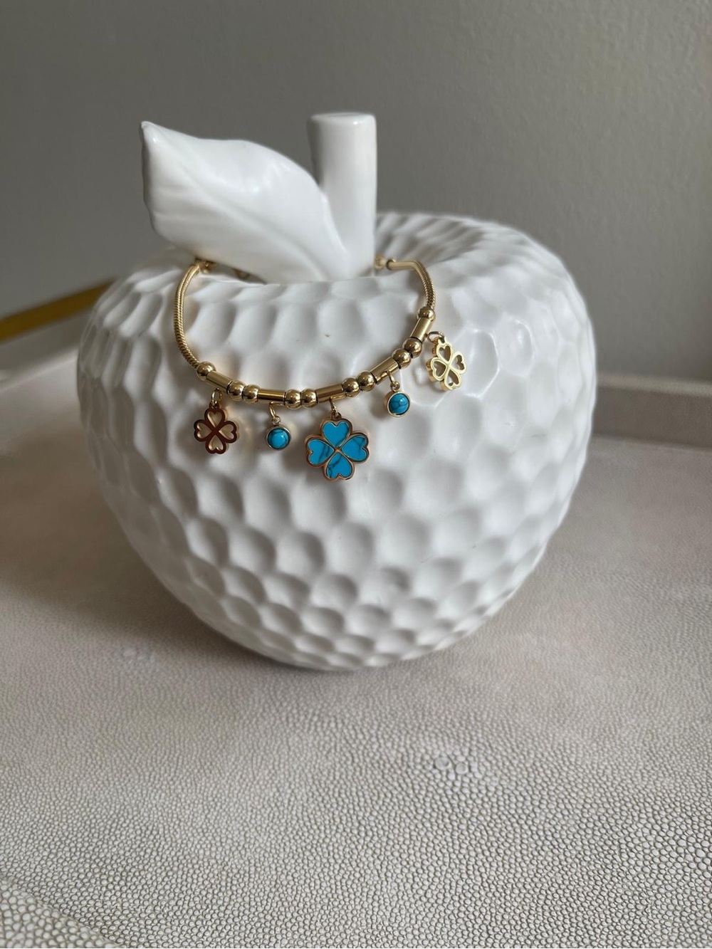 Gold-Tone Four-Leaf Clover Charm Bracelet with Turquoise Accents